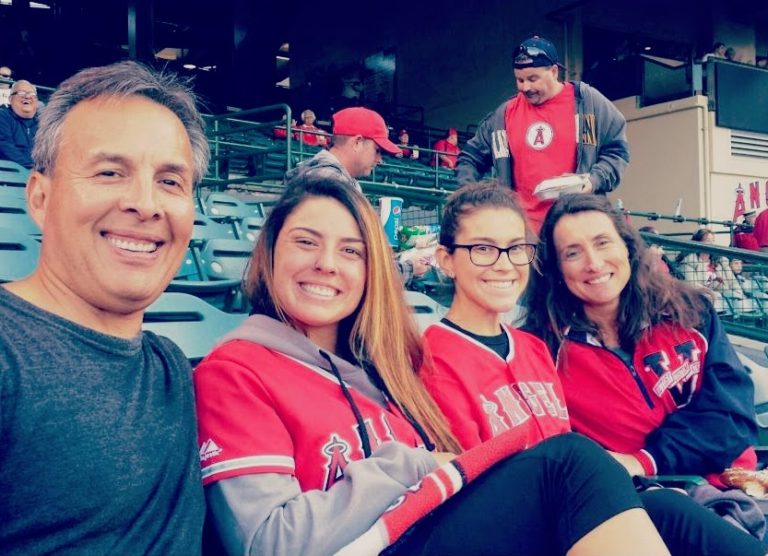 johns family at a baseball game